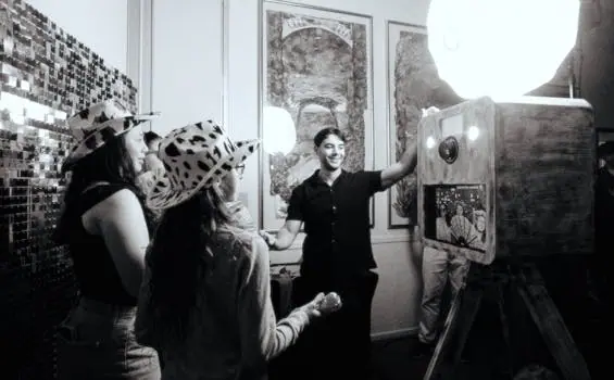 Carlos with the photobooth and guests