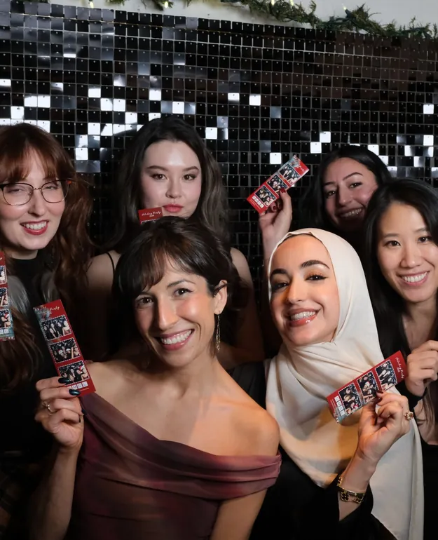 A group photo of coworkers at a corporate event