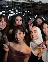 A group photo of coworkers at a corporate event